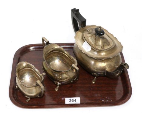 A three piece silver tea set 