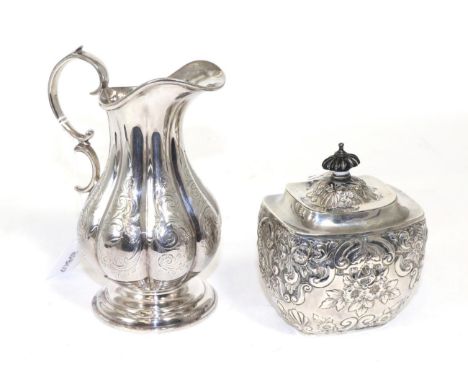 A late Victorian silver tea caddy, Birmingham, 1895, hinged lid, repousse decoration; together with a plated jug (2)