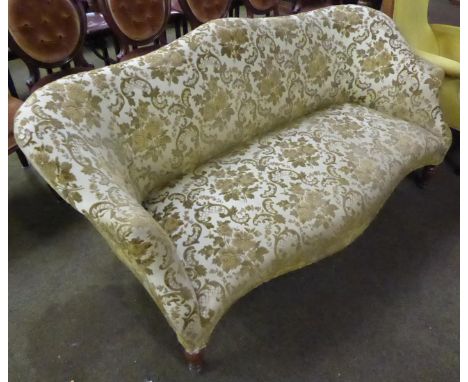 Victorian sofa upholstered in gold and cream fabric 