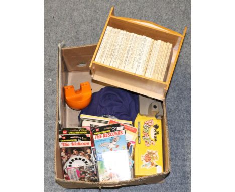 A collection of Viewmaster slides, a Baby Dragon Pelham Puppet, lead toys, Beatrix Potter books etc