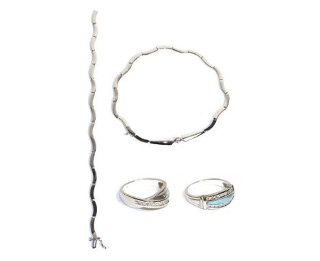 Two modern white metal and diamond rings, stamped 14k; with a similar necklace, damaged (3)Two modern metal rings - Finger si