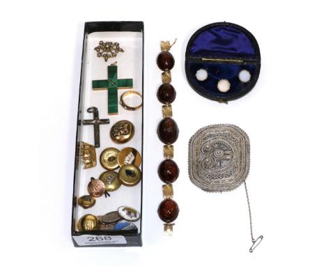 An 18 carat gold seed pearl set mourning ring, a yellow metal seed pearl set brooch (a.f.), a malachite cross pendant in a ye