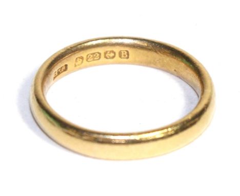 A 22 carat gold band ring Finger size G1/2, 3.47g gross. 