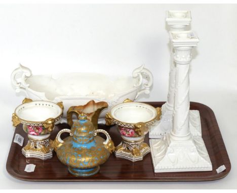 A group of ceramics comprising a Royal Worcester gilt and blush ivory leaf jug, a Royal Crown Derby twin handled urn and cove