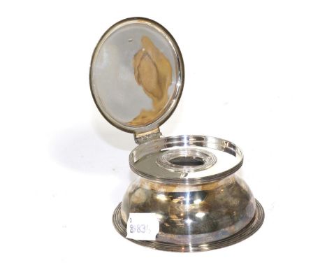 A silver circular section lidded inkwell, glass liner, Birmingham 