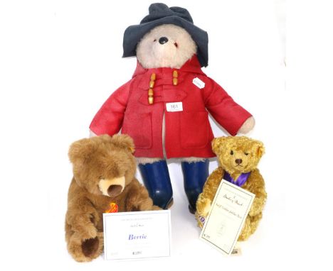 Paddington Bear in red coat and blue Dunlop Wellington boots, 50cm high; together with two modern Steiff bears, with dust bag