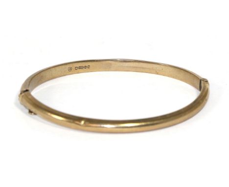 A 9 carat gold bangle 7.04g gross