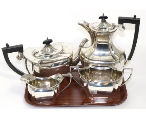 A four piece silver tea service, K Ltd, Birmingham 1928, of shaped oval form, the hot water jug 22.5cm high, 58.1ozt (4)