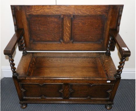 A 1920's oak monk's bench