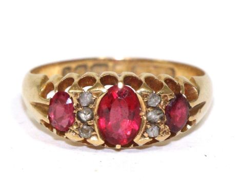 An 18 carat gold ruby and diamond ring (1) Finger size M1/2, 3.29g gross.