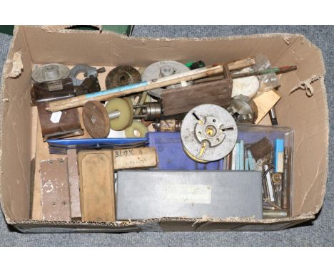 A metal working lathe with tools 