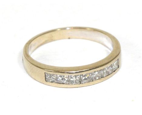 A princess cut diamond half hoop ring, stamped '750'Finger size O, 3.69g gross