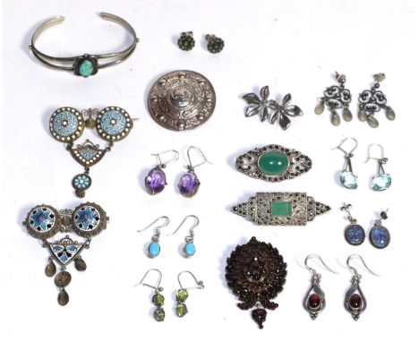 Two Norwegian enamelled solje brooches, a pair of solje earrings, five brooches, a turquoise set bangle, a pair of peridot dr
