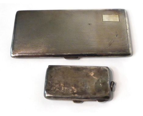 A large silver cigarette case with engine turned engraving; and a silver purse, lacking fitted interior 