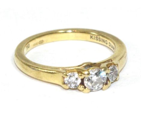 An 18 carat gold diamond three stone ring, with diamond set galleryFinger size I1/2, 3.34g gross. 