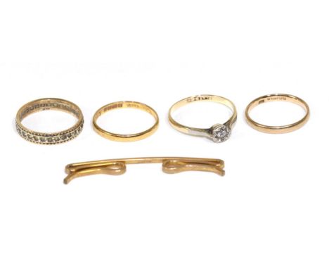 A solitaire ring, stamped '9ct' and 'PLAT'; with two gold bands and two other items (5)Solitaire ring - finger size Q, 1.61g 