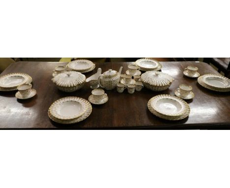 A Spode Fleur de Lis pattern dinner, tea and coffee service, six place settings, including teapot and two covered tureens 