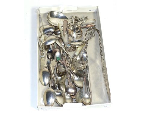 A collection of assorted spoons including caddy, tea and tourist examples, 19/20th century, together with asparagus tongs (qt