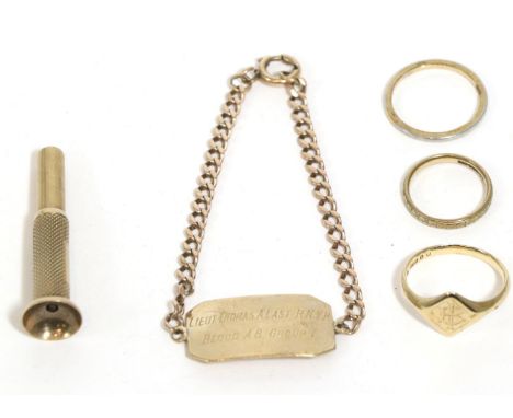 An identity bracelet, stamped '9ct', three 9 carat gold rings and a 9 carat gold cigar piercerIdentity bracelet - 10.62g gros