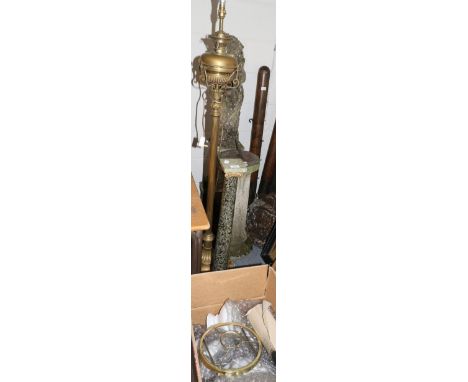 A brass standard lamp together with a marble column, oil lamps shades and funnels 