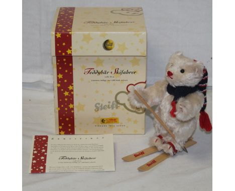 A Steiff "Teddy Bear Skier", limited edition 292 of 1500, having a  white mohair covered body, red and white striped woollen 