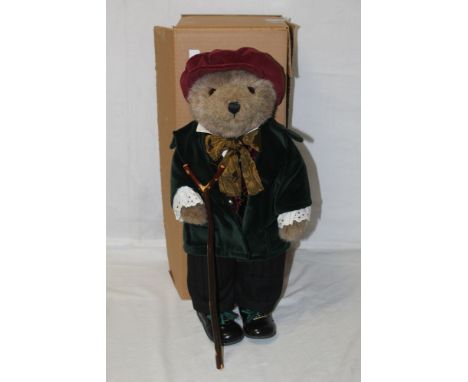 A Lakeland Bears teddy bear, titled "Wordsworth", having a light brown mohair covered body, corduroy flat cap, green velvet j