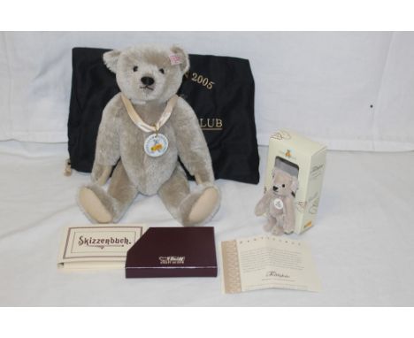 A Steiff Club Edition 2005 teddy bear, 420467, having a silver-grey mohair covered body, wearing a Steiff Club medallion arou