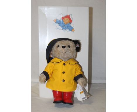 A Steiff Original "Paddington Bear", limited edition 2005 of 2500, having a blonde mohair covered body, wearing a yellow mack