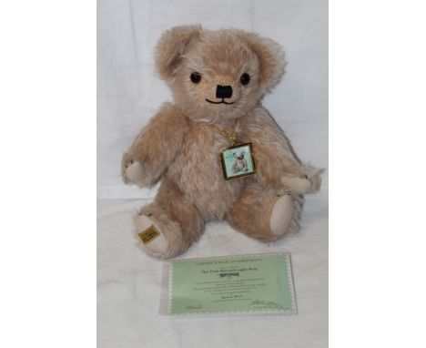 A Danbury Mint by Merrythought "The First Merrythought Bear", limited edition 145 of 1931, having a light brown mohair covere