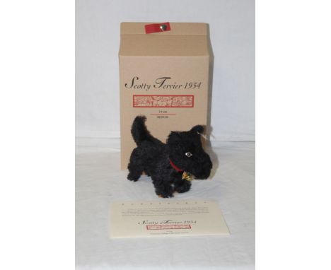 A Steiff replica "1934 Scotty Terrier", limited edition 525 of 3000, wearing a red leather collar, having oval glass eyes wit