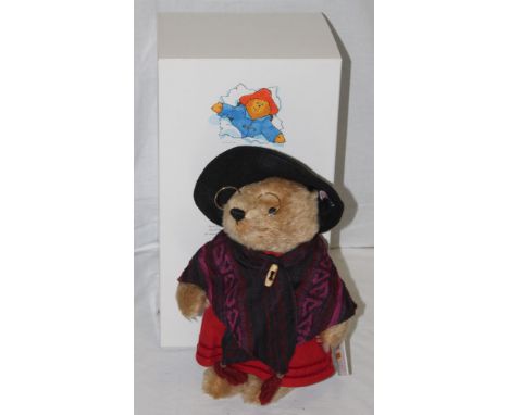 A Steiff teddy bear, "Aunt Lucy", limited edition, having a blonde mohair covered body, wearing smart round glasses and cloth