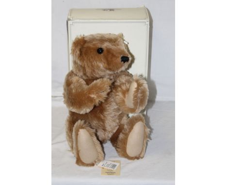 A Steiff Classic teddy bear, 000201, having a light brown mohair covered body, with plastic eyes, and measuring 55 cm tall, r