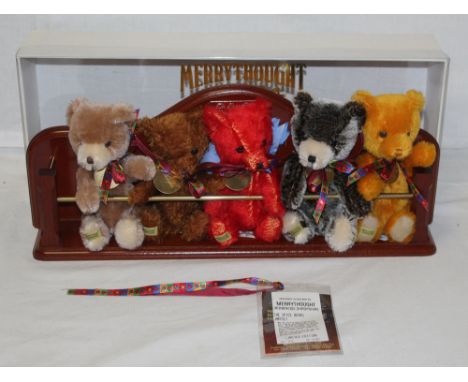 A Merrythought "The Spice Bears" set, comprising five teddy bears within a hand made wooden spice rack, each having their own