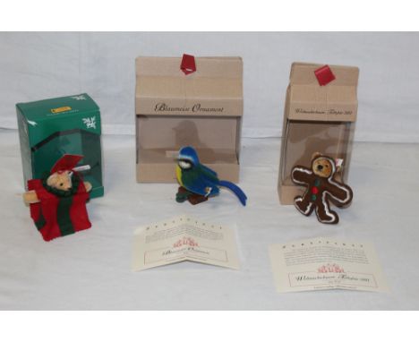 A group of Steiff Christmas ornaments, to include a Roly Poly Santa and a Christmas Tree 2000 bear