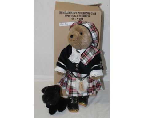 A Lakeland Bears teddy bear, titled "Rob Roy", having a light brown mohair covered body, wearing traditional Scottish outfit,