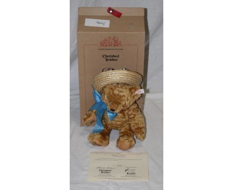 A Steiff North American exclusive teddy bear, "Daisy", limited edition 3565 of 5000, having a blonde mohair body, blue ribbon