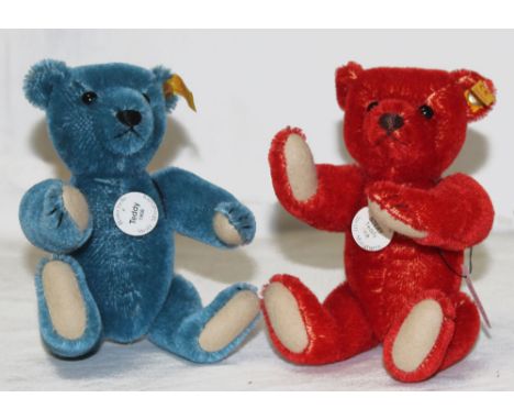 Two coloured Steiff Club Edition teddy bears, comprising a blue 1908 teddy bear and a red 'Teddy Rot' bear, both measuring 16