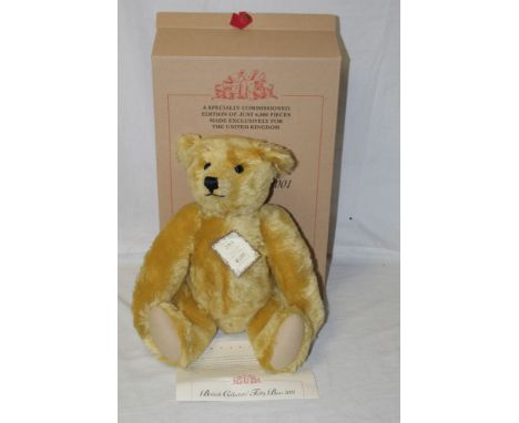 A Steiff "British Collector's Teddy Bear 2001", limited edition 2435 of 4000, having a brass mohair covered body, a working g