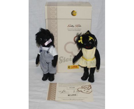 A Steiff replica character doll set, "Golly Kids", limited edition 101 of 1500, comprising a boy and girl, both with jointed 