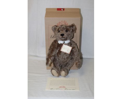 A Steiff "British Collectors Teddy Bear 2004", limited edition  2571 of 4000, having a caramel mohair covered body, wearing a