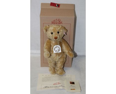 A Steiff "Teddy Bear with Elephant Stencil", limited edition 1343 of 1904, having a blonde mohair covered body, patinated ele