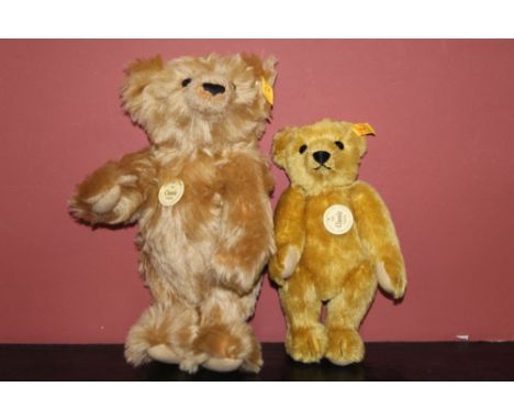 A Steiff Classic 1903 replica teddy bear, having a caramel mohair covered body, with chest tag, and a smaller Classic 1909 re