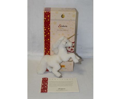 A Steiff "Unicorn", limited edition 190 of 1500, having a thick white alpaca coat and shiny gold coloured horn, measuring 25c