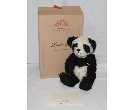 A Steiff teddy bear, "Panda", limited edition 1352 of 2000, the bear having black and white mohair covered body, button and w