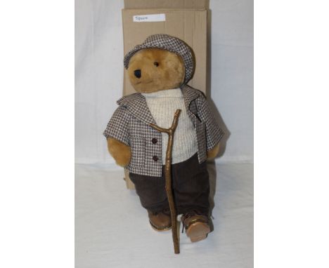 A Lakeland Bears teddy bear, titled "Squire", having a light brown mohair covered body, wearing a matching tweed jacket and c