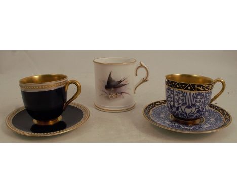 A Royal Worcester mug, decorated with a swallow, circa 1904, height 2.25ins, together with two Royal Worcester coffee cans, o
