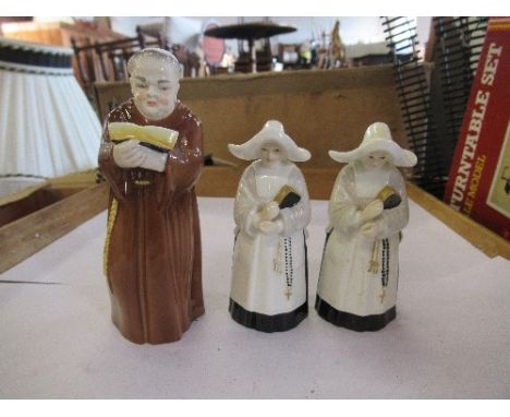 3 Royal Worcester candle snuffers, 2 nuns and a monk