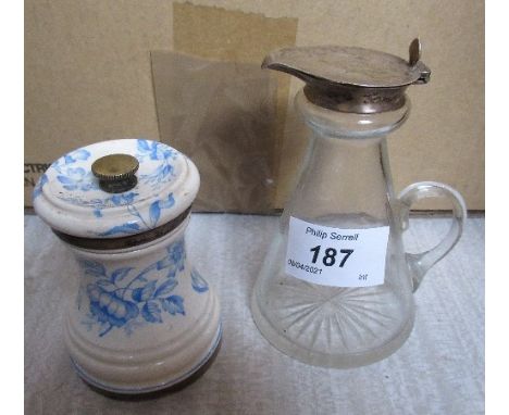 A whisky tot decanter, with hallmarked silver mount, and porcelain pepper grinder in hallmarked silver mount