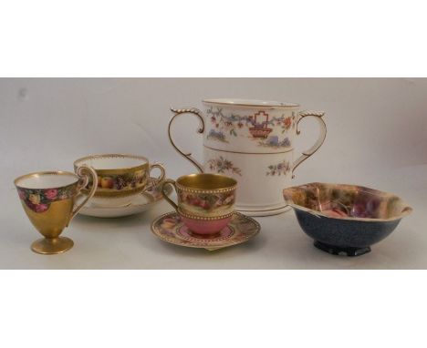 A Royal Worcester bowl, decorated with hand painted fruit by Roberts, together with a coffee cup and saucer, decorated with b