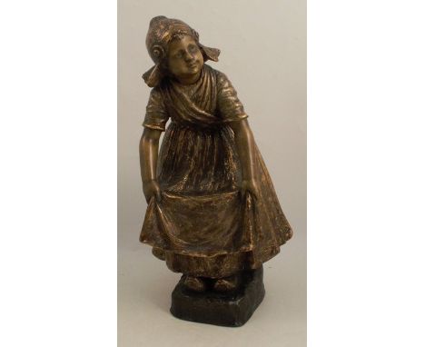 A Goldscheider terracotta figure, of a Dutch girl, with gilt finish, impressed 2995, height 15.5insCondition Report:  Good co